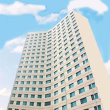 Overseas Chinese International Hotel Qingdao Bagian luar foto