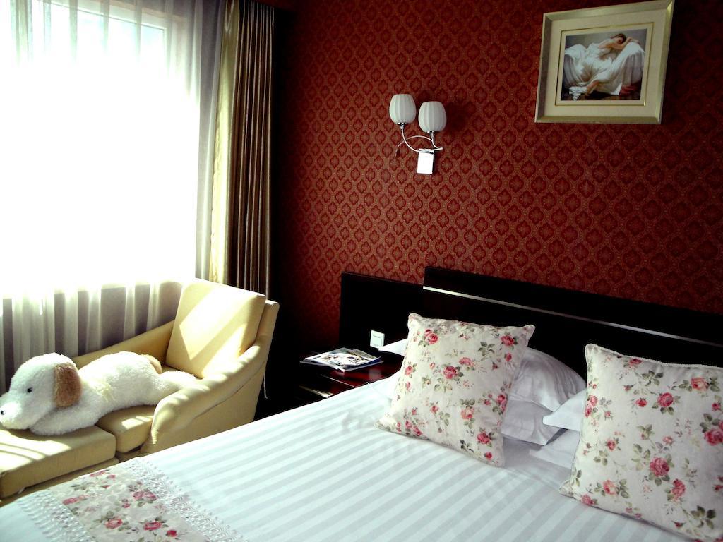 Overseas Chinese International Hotel Qingdao Bagian luar foto