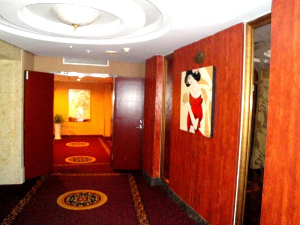 Overseas Chinese International Hotel Qingdao Bagian luar foto