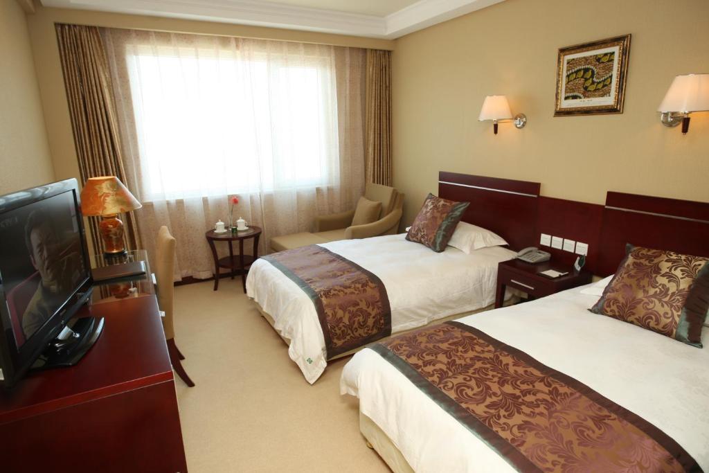Overseas Chinese International Hotel Qingdao Bagian luar foto