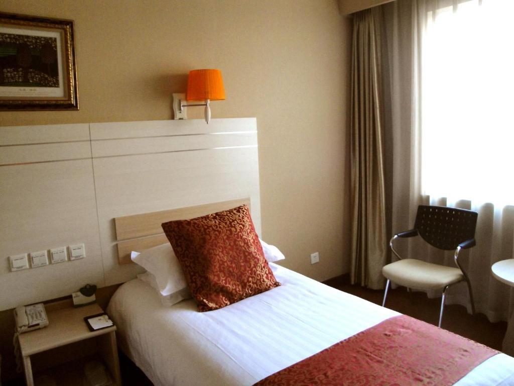 Overseas Chinese International Hotel Qingdao Ruang foto