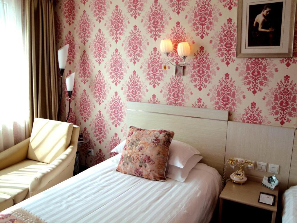 Overseas Chinese International Hotel Qingdao Ruang foto