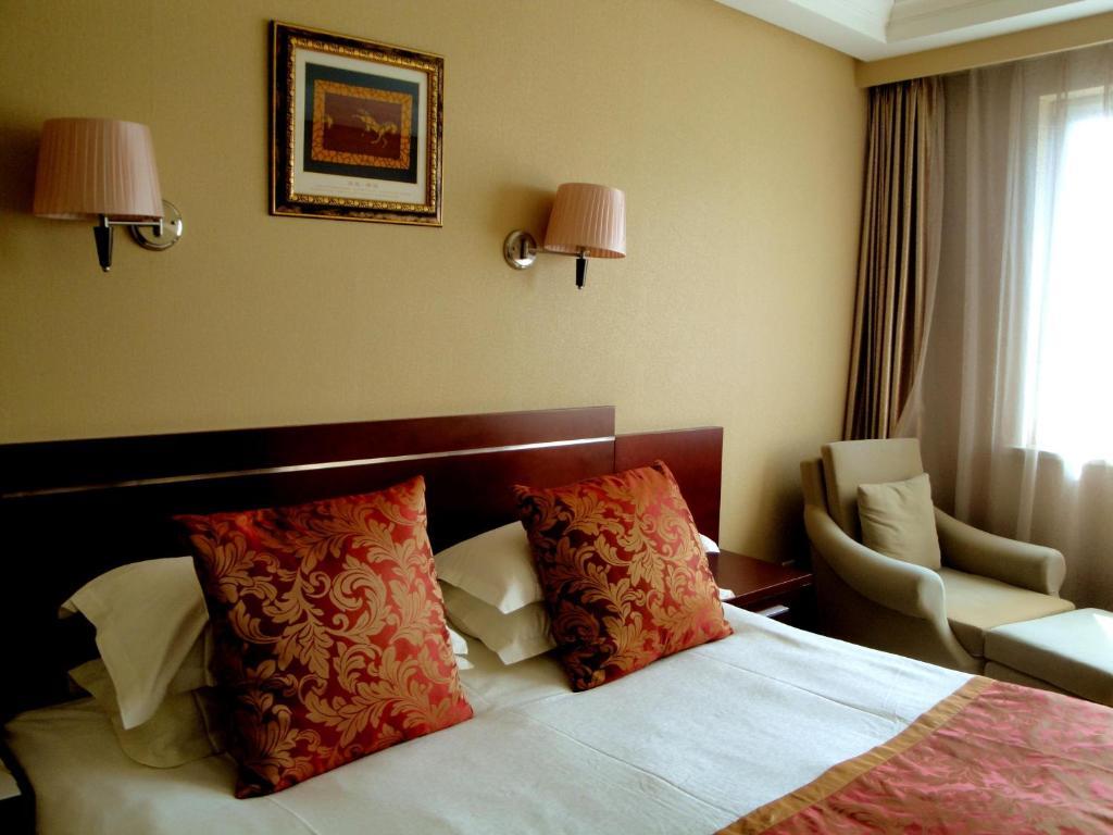Overseas Chinese International Hotel Qingdao Ruang foto